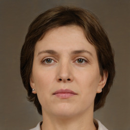 Neutral white young-adult female with short  brown hair and brown eyes