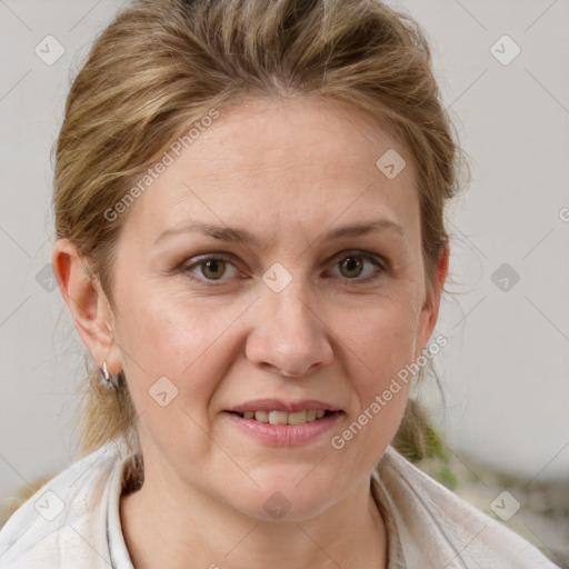 Joyful white adult female with medium  brown hair and grey eyes