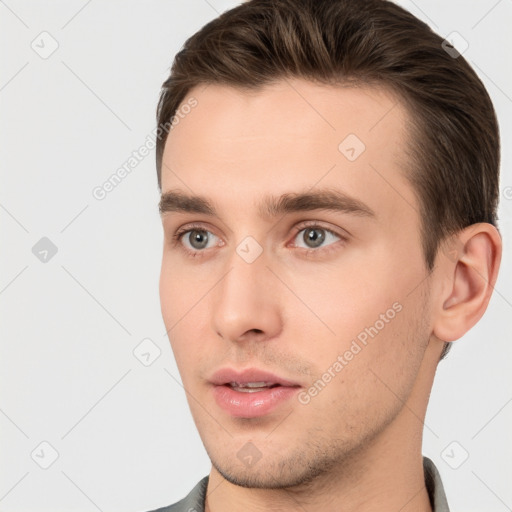 Neutral white young-adult male with short  brown hair and brown eyes