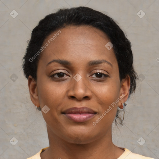 Joyful black young-adult female with short  brown hair and brown eyes