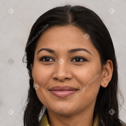 Joyful latino young-adult female with long  brown hair and brown eyes