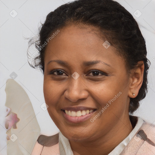 Joyful black young-adult female with medium  brown hair and brown eyes