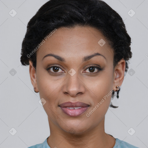 Joyful black young-adult female with short  black hair and brown eyes