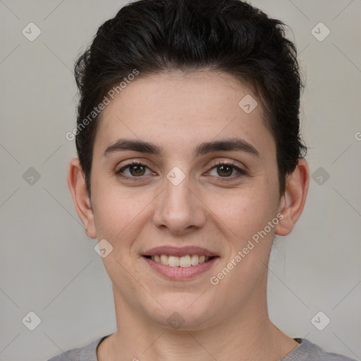 Joyful white young-adult female with short  brown hair and brown eyes