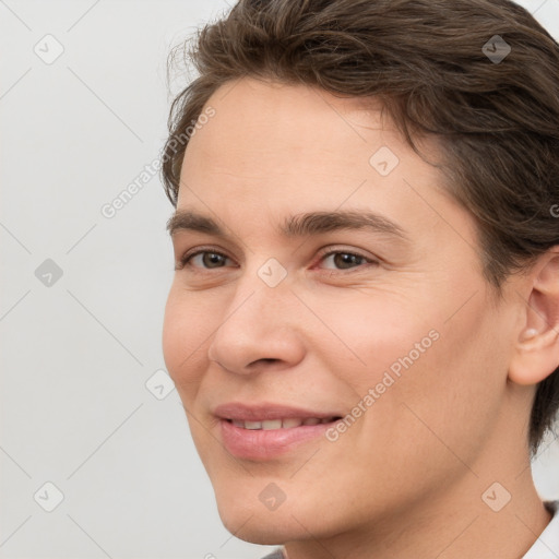 Joyful white young-adult male with medium  brown hair and brown eyes