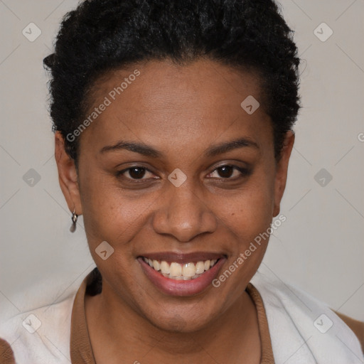 Joyful black young-adult female with short  brown hair and brown eyes