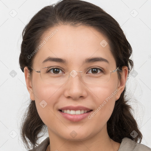 Joyful white young-adult female with medium  brown hair and brown eyes