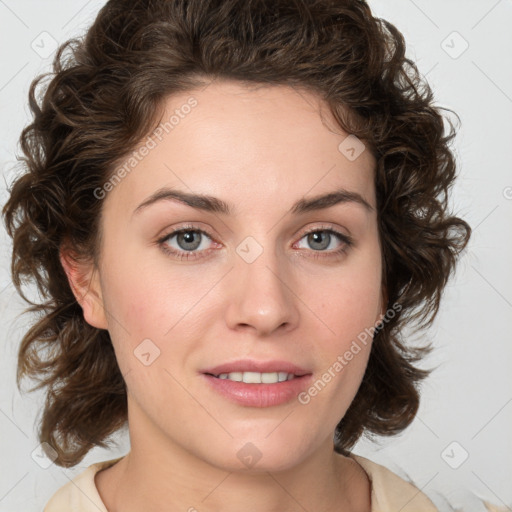 Joyful white young-adult female with medium  brown hair and green eyes