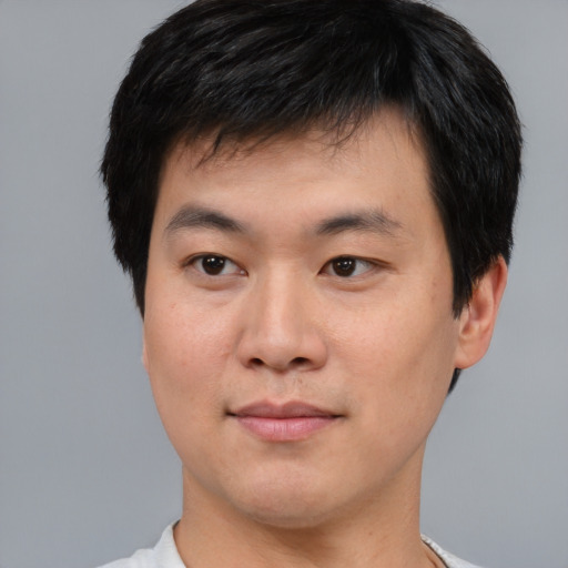 Neutral asian young-adult male with short  black hair and brown eyes