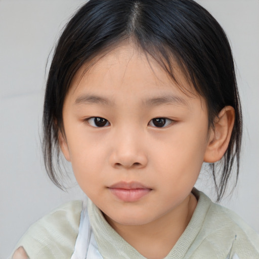 Neutral asian child female with medium  brown hair and brown eyes