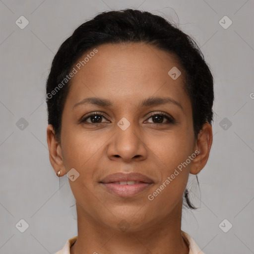 Joyful latino young-adult female with short  brown hair and brown eyes