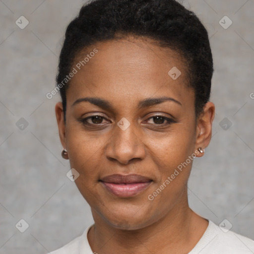 Joyful black young-adult female with short  black hair and brown eyes