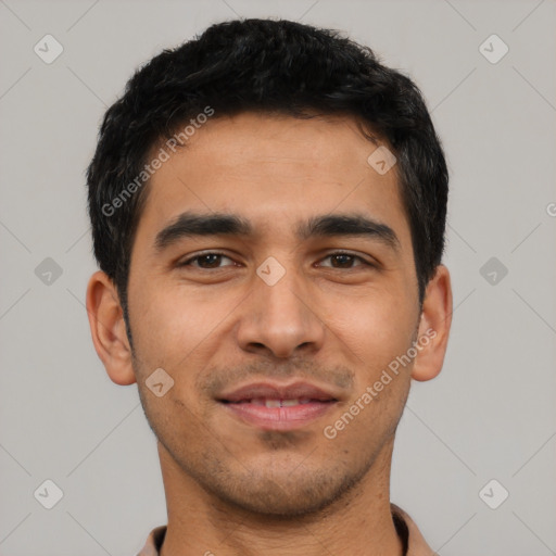 Joyful latino young-adult male with short  black hair and brown eyes
