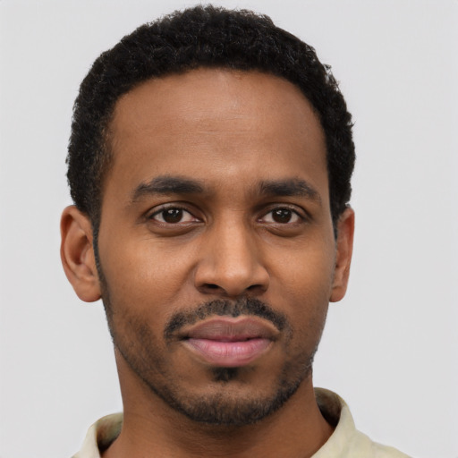 Neutral black young-adult male with short  black hair and brown eyes