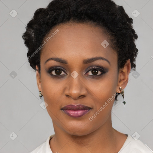 Joyful black young-adult female with short  black hair and brown eyes