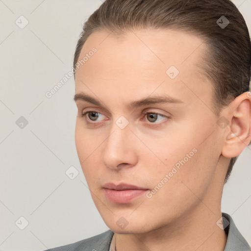 Neutral white young-adult male with short  brown hair and brown eyes