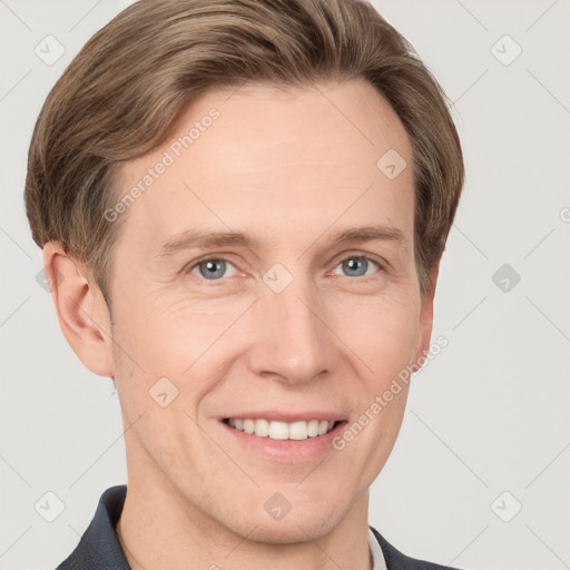 Joyful white adult male with short  brown hair and grey eyes