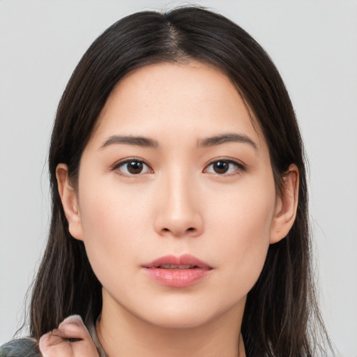 Neutral asian young-adult female with long  brown hair and brown eyes