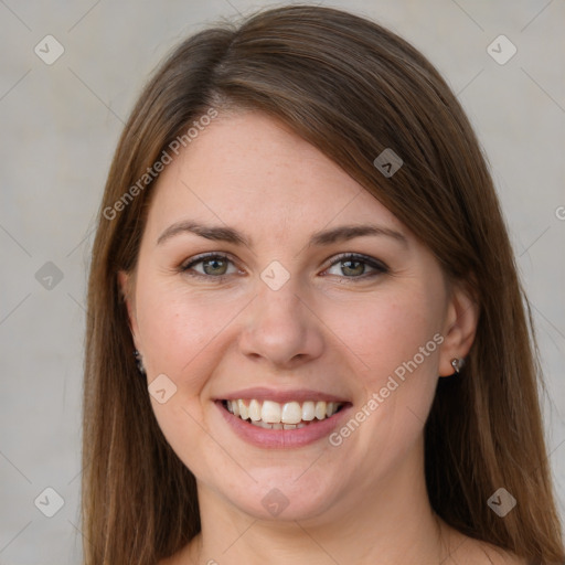 Joyful white young-adult female with long  brown hair and grey eyes