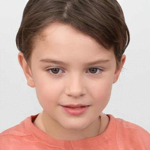 Joyful white child female with short  brown hair and brown eyes