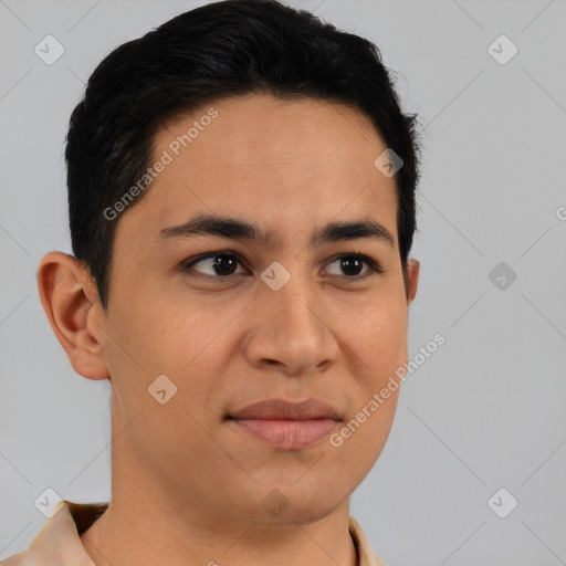 Joyful latino young-adult male with short  brown hair and brown eyes