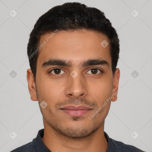 Neutral latino young-adult male with short  black hair and brown eyes