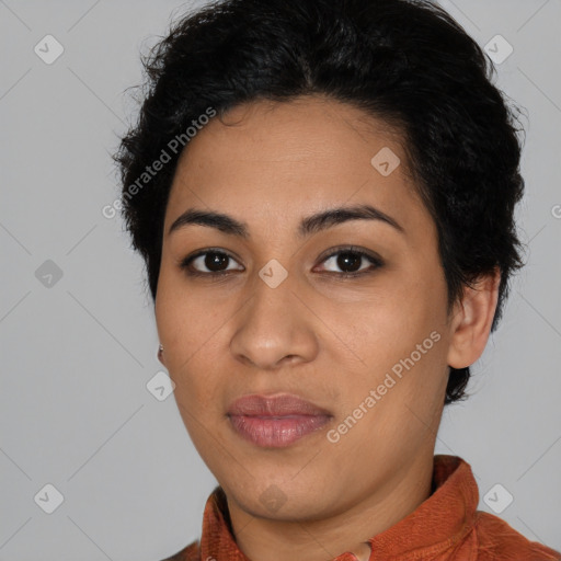 Joyful latino young-adult female with medium  brown hair and brown eyes