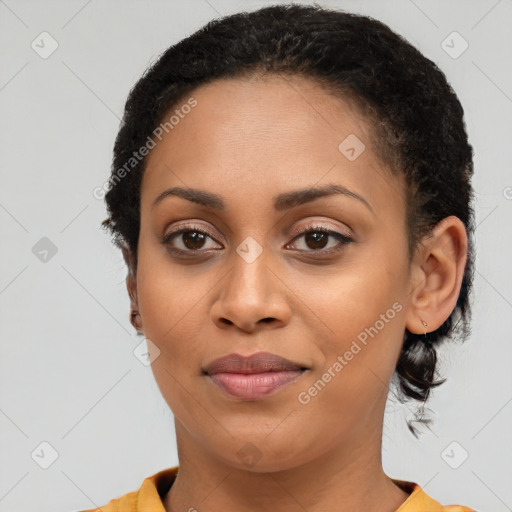 Joyful latino young-adult female with short  brown hair and brown eyes