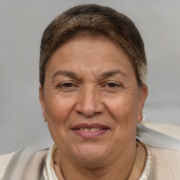 Joyful white adult female with short  brown hair and brown eyes