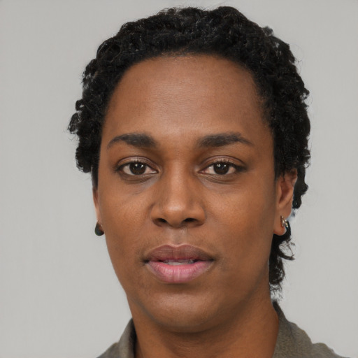 Neutral black young-adult female with short  black hair and brown eyes