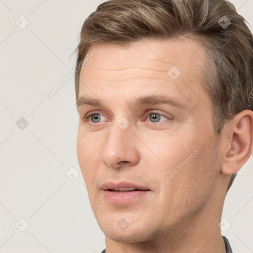 Joyful white adult male with short  brown hair and grey eyes