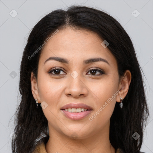 Joyful latino young-adult female with long  brown hair and brown eyes