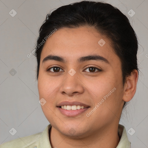 Joyful white young-adult female with short  brown hair and brown eyes