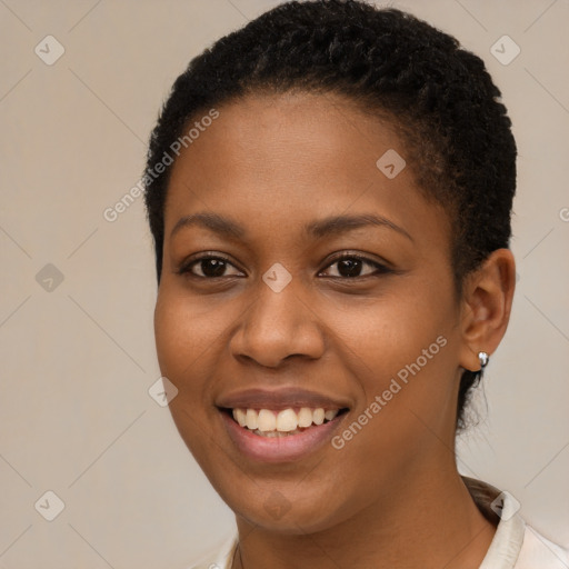 Joyful black young-adult female with short  brown hair and brown eyes