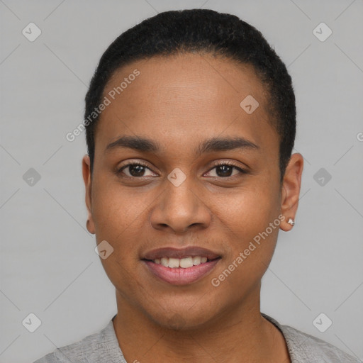 Joyful black young-adult male with short  black hair and brown eyes