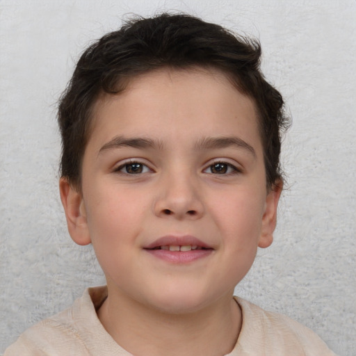 Joyful white child female with short  brown hair and brown eyes