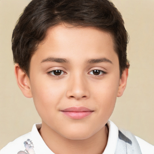 Joyful white child male with short  brown hair and brown eyes