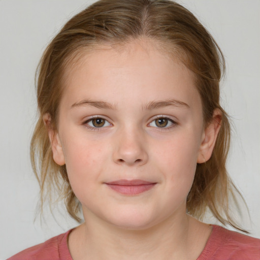 Joyful white child female with medium  brown hair and grey eyes