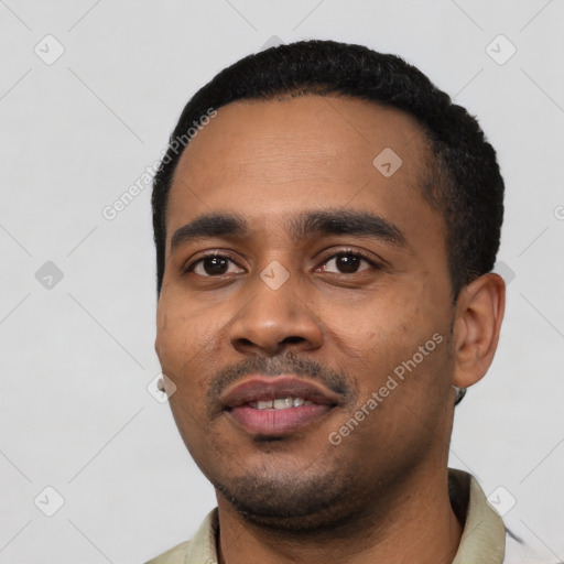 Neutral latino young-adult male with short  black hair and brown eyes