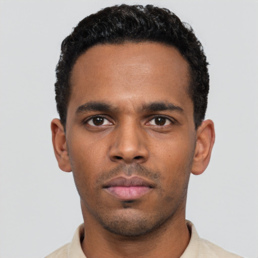 Neutral black young-adult male with short  black hair and brown eyes