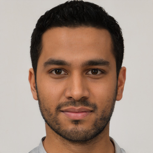 Neutral latino young-adult male with short  black hair and brown eyes
