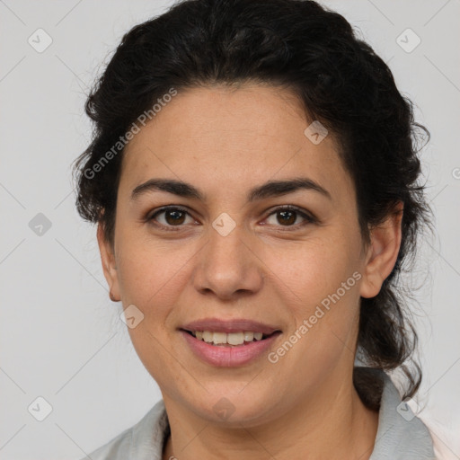 Joyful latino young-adult female with medium  brown hair and brown eyes