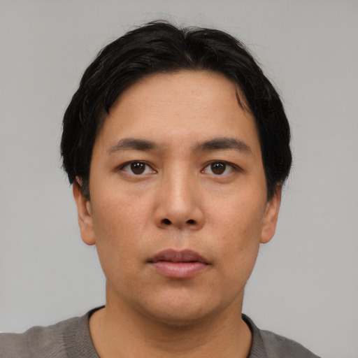 Neutral asian young-adult male with short  black hair and brown eyes