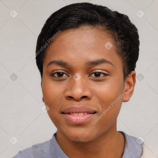 Joyful black young-adult female with short  black hair and brown eyes