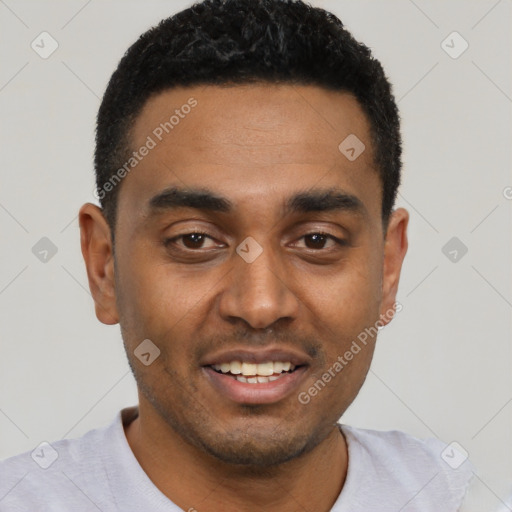 Joyful black young-adult male with short  black hair and brown eyes