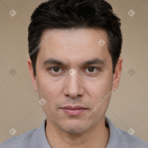 Neutral white young-adult male with short  black hair and brown eyes