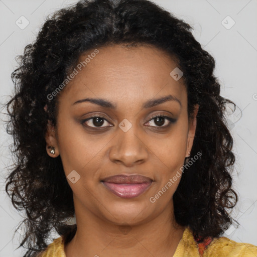 Joyful black young-adult female with long  brown hair and brown eyes