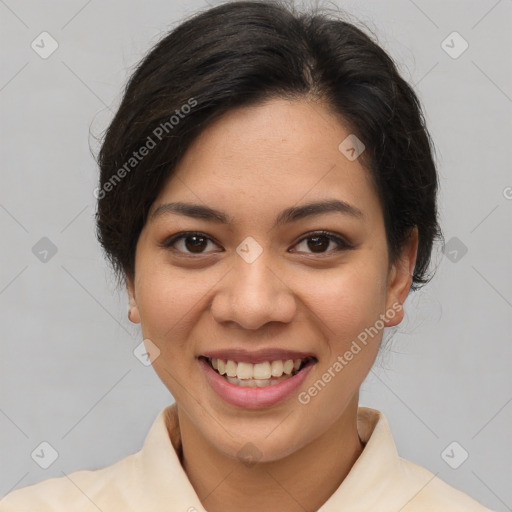 Joyful latino young-adult female with short  brown hair and brown eyes