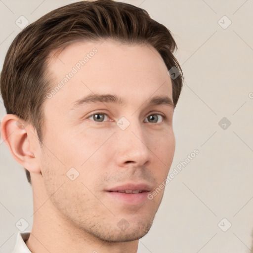 Neutral white young-adult male with short  brown hair and grey eyes