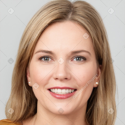 Joyful white young-adult female with long  brown hair and grey eyes